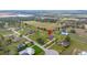 Aerial view of a neighborhood showcasing the home's location and large surrounding lots and community amenities at 14739 Vista View Ct, Dade City, FL 33523