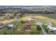 Aerial view of a neighborhood showcasing the home's location with solar farms and proximity to community amenities at 14739 Vista View Ct, Dade City, FL 33523