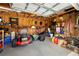 Organized shed interior, providing ample storage for lawn equipment and tools at 14739 Vista View Ct, Dade City, FL 33523