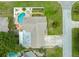 Aerial view showcasing the pool, backyard, and overall property layout at 1560 Bel Keene Dr, Clearwater, FL 33756