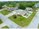 The house and pool are pictured from above, showing the location on a corner lot at 1560 Bel Keene Dr, Clearwater, FL 33756