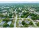 Beautiful aerial view of the neighborhood showing mature trees and well-maintained homes at 1560 Bel Keene Dr, Clearwater, FL 33756