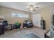 Bedroom featuring a ceiling fan and a window allowing natural light at 1560 Bel Keene Dr, Clearwater, FL 33756