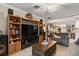 Open-concept living room with entertainment center and comfortable seating at 1560 Bel Keene Dr, Clearwater, FL 33756