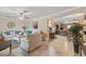 Open-concept living room with tile floors, comfortable sofas, and seamless flow at 1560 Bel Keene Dr, Clearwater, FL 33756