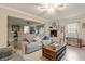 Spacious living room featuring a fireplace and comfortable seating at 1560 Bel Keene Dr, Clearwater, FL 33756