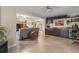 Entertaining area boasts custom cabinetry, a wine cooler, and a ceiling fan at 1560 Bel Keene Dr, Clearwater, FL 33756
