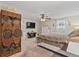 Inviting main bedroom with a ceiling fan and ample natural light at 1560 Bel Keene Dr, Clearwater, FL 33756