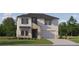 Two-story home with stone accents and a landscaped lawn at 18429 Serene Lake Loop, Lutz, FL 33548