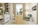 Home office with built-in shelving and a comfortable workspace at 18429 Serene Lake Loop, Lutz, FL 33548
