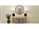 Entryway with a console table, mirror, and lamps at 18435 Serene Lake Loop, Lutz, FL 33548