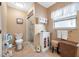 Well-lit bathroom features a shower, ample storage, and a large window for great natural lighting at 2589 Northfield Ln, Clearwater, FL 33761