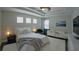 Bright main bedroom featuring a decorative ceiling, many windows, and a luxurious contemporary design at 3328 W Palmetto St, Tampa, FL 33607