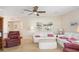 Warm and inviting living room with plush seating, accent pillows, and ambient lighting at 36852 Kimela Ave, Zephyrhills, FL 33542