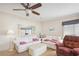 Cozy living room with comfortable seating, soft lighting, and neutral decor at 36852 Kimela Ave, Zephyrhills, FL 33542
