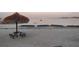 Beach with picnic table, shade hut, and water view at 3730 42Nd S Way # K, St Petersburg, FL 33711