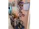 A decorated entryway featuring a shelf, flowers, photos, and a mounted artwork, adding a personalized touch at 3730 42Nd S Way # K, St Petersburg, FL 33711