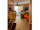 Living room with tile floors, neutral furniture, and a sliding door to a balcony or patio at 3730 42Nd S Way # K, St Petersburg, FL 33711