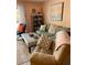 Inviting living room with a comfortable sofa, patterned rug, and natural light at 3730 42Nd S Way # K, St Petersburg, FL 33711