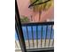 View from a condo of the community pool surrounded by palm trees at 3730 42Nd S Way # K, St Petersburg, FL 33711