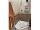 Corner shower with glass enclosure and decorative tile at 3730 42Nd S Way # K, St Petersburg, FL 33711