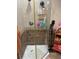 Shower with glass door, tiled walls, and a showerhead at 3730 42Nd S Way # K, St Petersburg, FL 33711