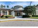 Stunning community clubhouse features attractive landscaping and a grand entrance at 3852 Sorrel Vine Dr, Wesley Chapel, FL 33544