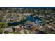 A waterfront property with canal access, surrounded by lush greenery and mature trees at 4601 Carson Ne St, St Petersburg, FL 33703