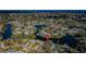Discover waterfront living in this aerial shot, showcasing a home with access to a beautiful bay at 4601 Carson Ne St, St Petersburg, FL 33703