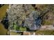 Aerial view of a charming single-Gathering home with a large tree-shaded yard at 4601 Carson Ne St, St Petersburg, FL 33703