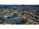 An inviting waterfront property featuring a canal, private dock, and an in-ground pool at 4601 Carson Ne St, St Petersburg, FL 33703