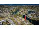 Stunning aerial perspective showcasing a waterfront home, nestled in a vibrant neighborhood with easy bay access at 4601 Carson Ne St, St Petersburg, FL 33703