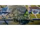 A waterfront property featuring a private dock and fenced backyard at 4601 Carson Ne St, St Petersburg, FL 33703