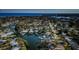 Waterfront homes are nestled among lush greenery, offering stunning views of the bay and canals at 4601 Carson Ne St, St Petersburg, FL 33703