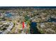 Breathtaking aerial view highlighting a waterfront home in a community with winding canals and waterways at 4601 Carson Ne St, St Petersburg, FL 33703