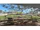 Scenic backyard with a wooden deck and views of a serene waterfront at 4601 Carson Ne St, St Petersburg, FL 33703