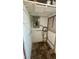 Unfinished basement space with exposed elements, painted walls, and tile flooring at 4601 Carson Ne St, St Petersburg, FL 33703