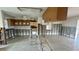 Bright kitchen undergoing renovation, showcasing tile flooring and appliances partially installed at 4601 Carson Ne St, St Petersburg, FL 33703