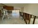 Large, open living area showcasing tile floors, exposed wall framing and natural light at 4601 Carson Ne St, St Petersburg, FL 33703