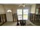 Bright living room undergoing renovation, with big window at 4601 Carson Ne St, St Petersburg, FL 33703