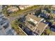 An aerial view highlighting the property's layout, mature landscaping, parking, and proximity to amenities at 4777 Duhme Rd # 1A, St Petersburg, FL 33708