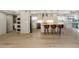 Gourmet kitchen with marble counters, stainless steel appliances, island seating, and hardwood flooring at 4777 Duhme Rd # 1A, St Petersburg, FL 33708