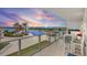 Enjoy stunning sunset views from this spacious private balcony with dining and lounge areas at 5120 Marina Way # 6603, Tampa, FL 33611