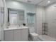 Bright bathroom with a glass shower, large vanity, and ample storage at 5120 Marina Way # 6603, Tampa, FL 33611