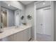 Contemporary bathroom with a long vanity and modern mirror at 5120 Marina Way # 6603, Tampa, FL 33611