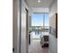 Bedroom with view of the water and walk-in closet, features light gray walls at 5120 Marina Way # 6603, Tampa, FL 33611