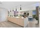 Open kitchen with quartz countertops and seamless access to a cozy living space at 5120 Marina Way # 6603, Tampa, FL 33611