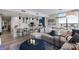 Open concept living room flows into kitchen with breakfast bar and view of waterfront at 5120 Marina Way # 6603, Tampa, FL 33611