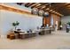 Stunning lobby area features unique wood trim, a reception desk and contemporary lighting at 5120 Marina Way # 6603, Tampa, FL 33611