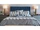 Well decorated main bedroom with upholstered headboard, side tables, and modern lamps at 5120 Marina Way # 6603, Tampa, FL 33611